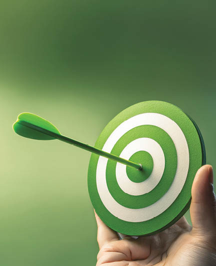The Green Target with Dart Symbolizing Focus and Achievement in Business Goals