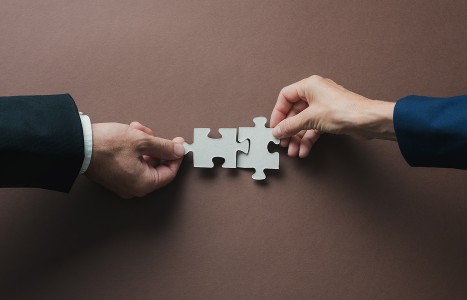 NBCE-FCLB Merger Approved