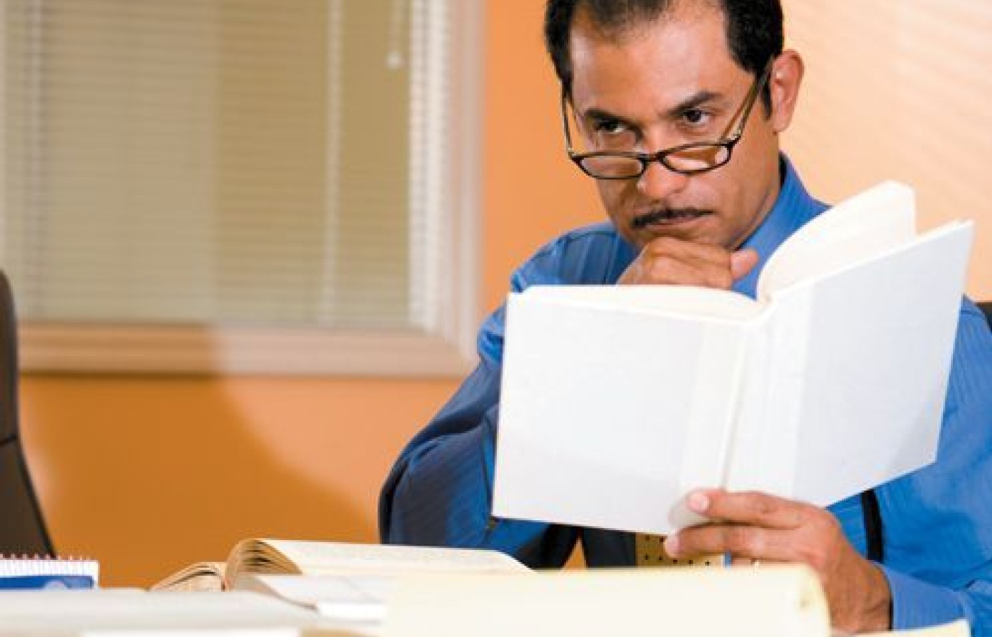 man reading book